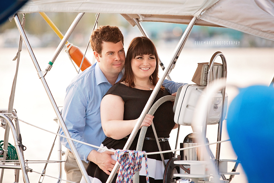 engagement couple driving sailboat in whitby