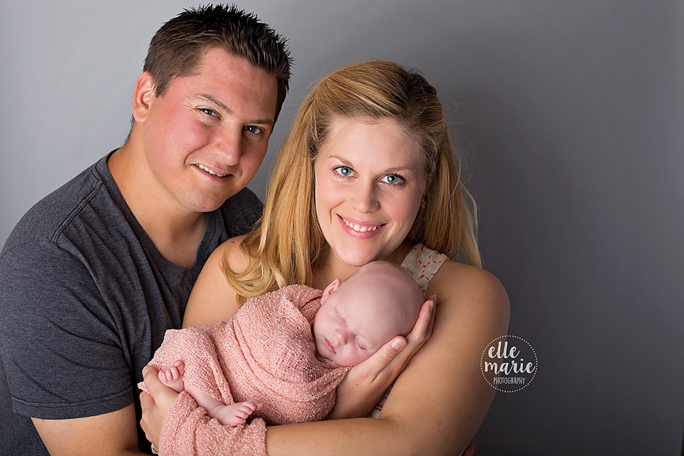 newborn with family