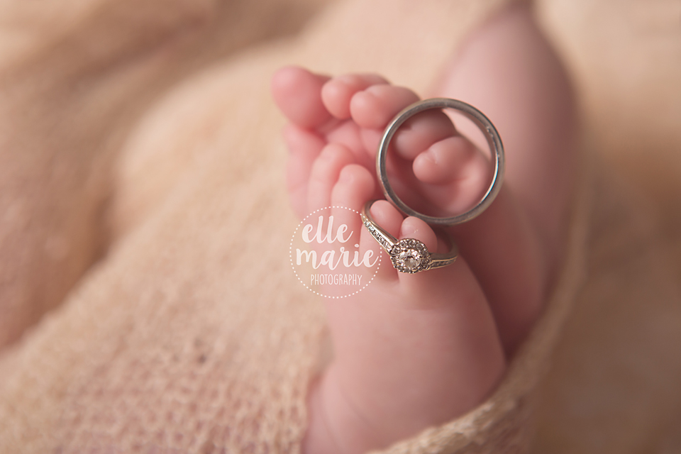 wedding rings on newborn toes