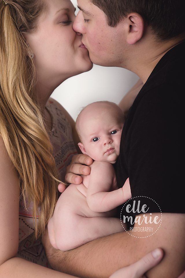 newborn with family