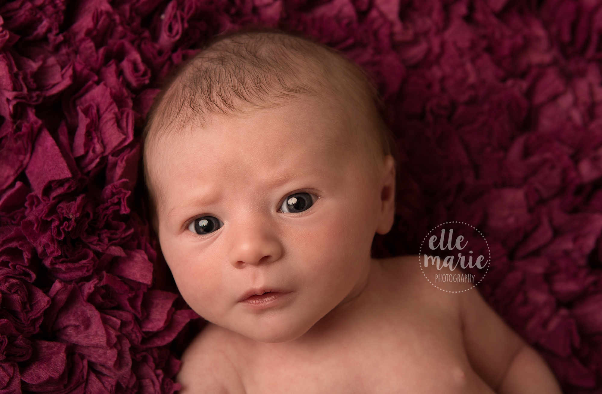 newborn with eyes open
