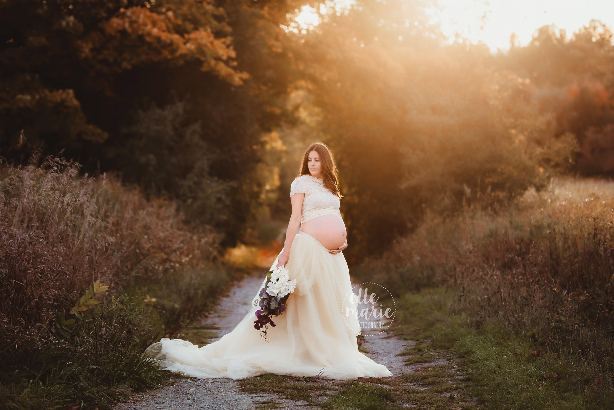 Expecting mom in the fall foliage