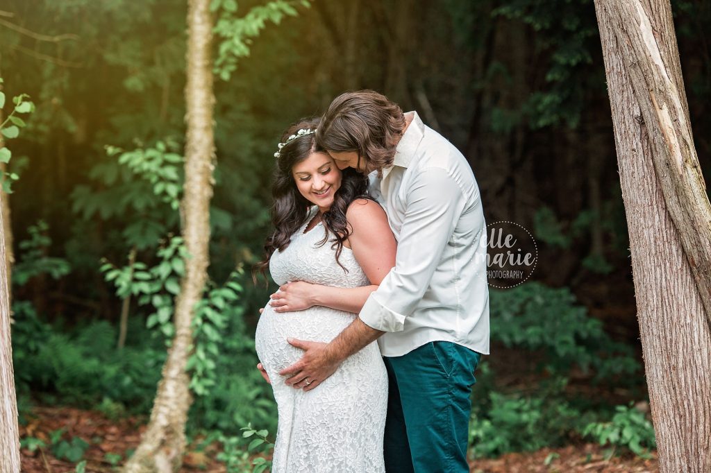 expecting couple share an intimate moment