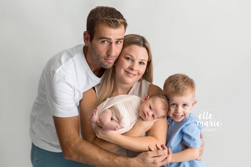 newborn baby girl with her family