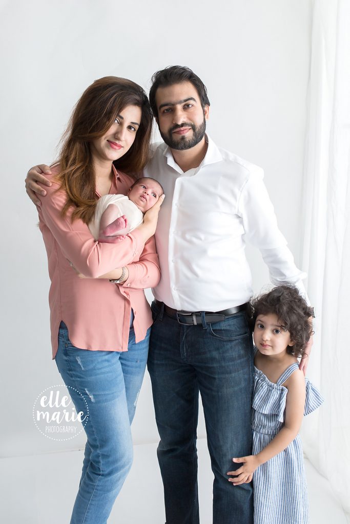 newborn baby girl with her family