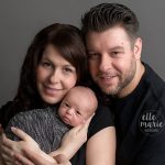 mom and dad with newborn boy