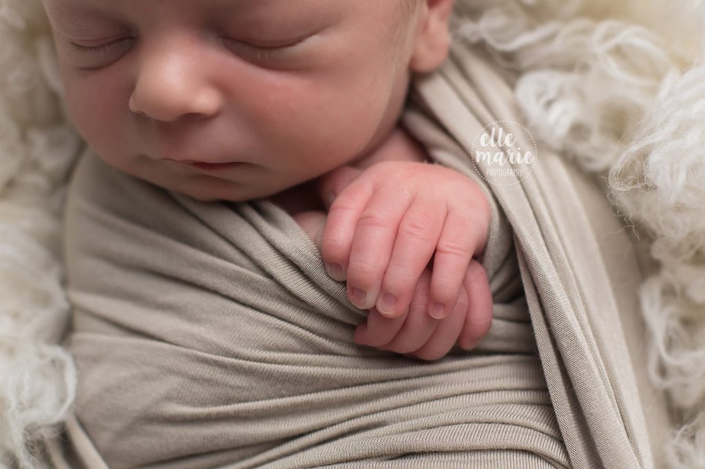 close up of newborn hands