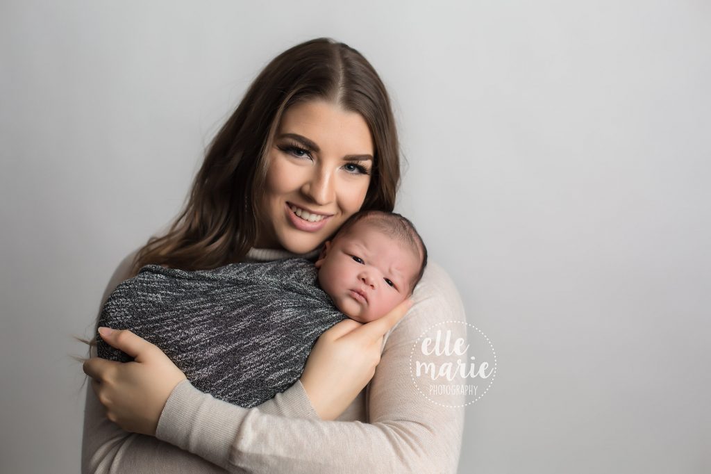 newborn in mom's arms