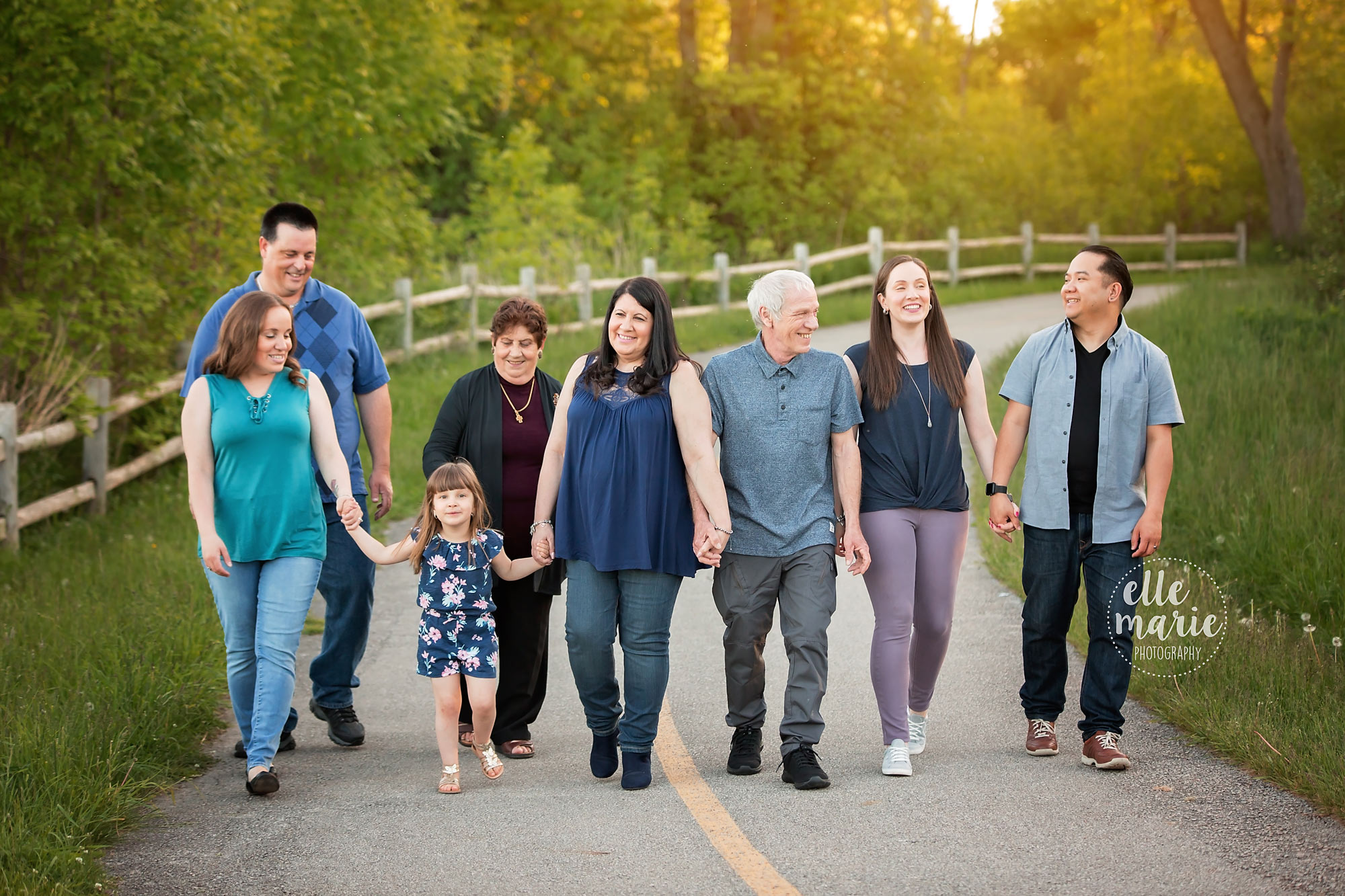 extended family photo of a 4 generation family in a park