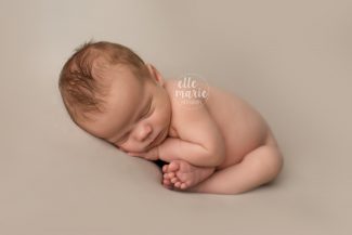 Newborn Baby boy in taco pose