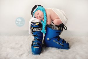 newborn on ski boots
