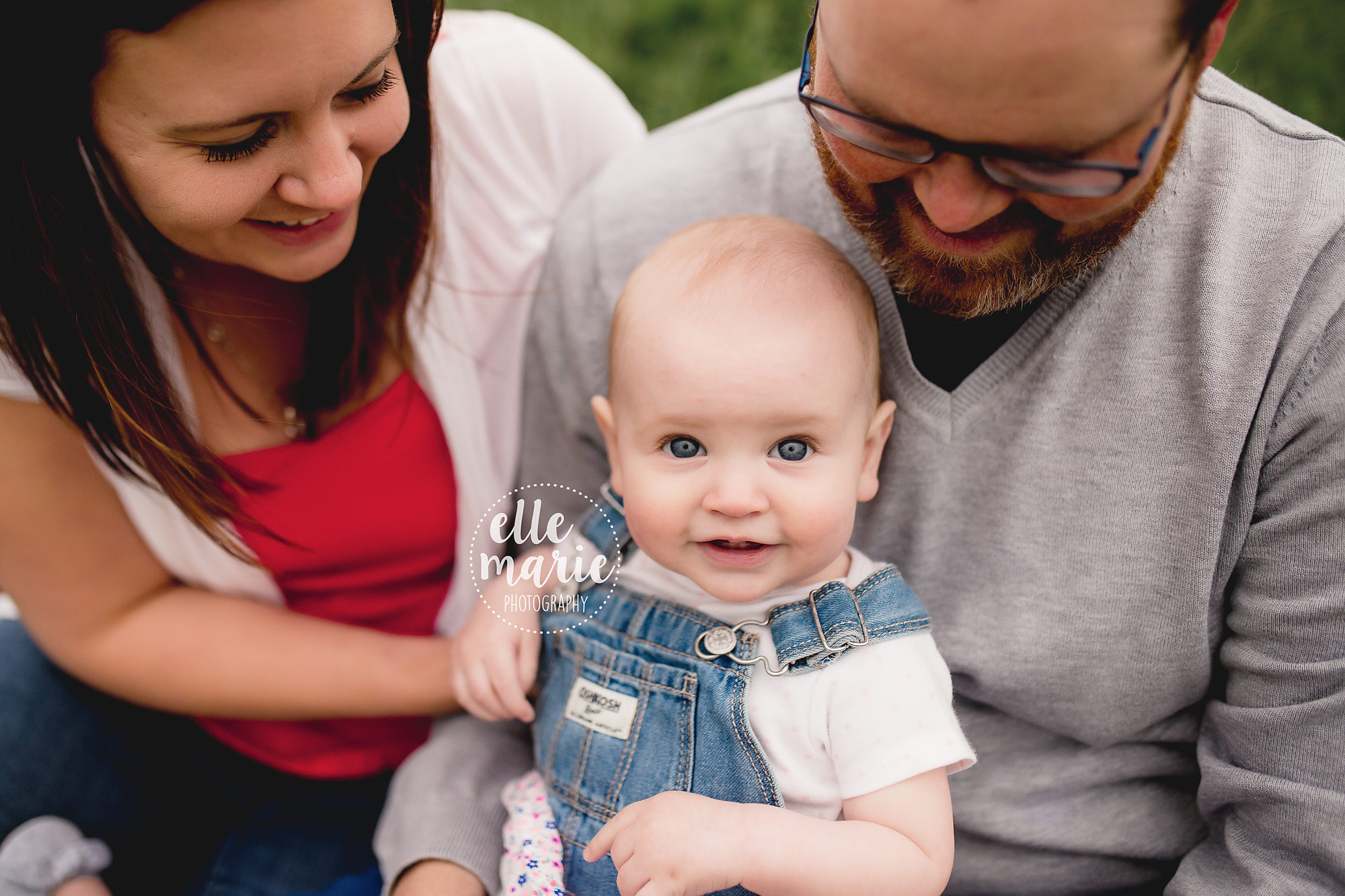 9 month old baby girl with family