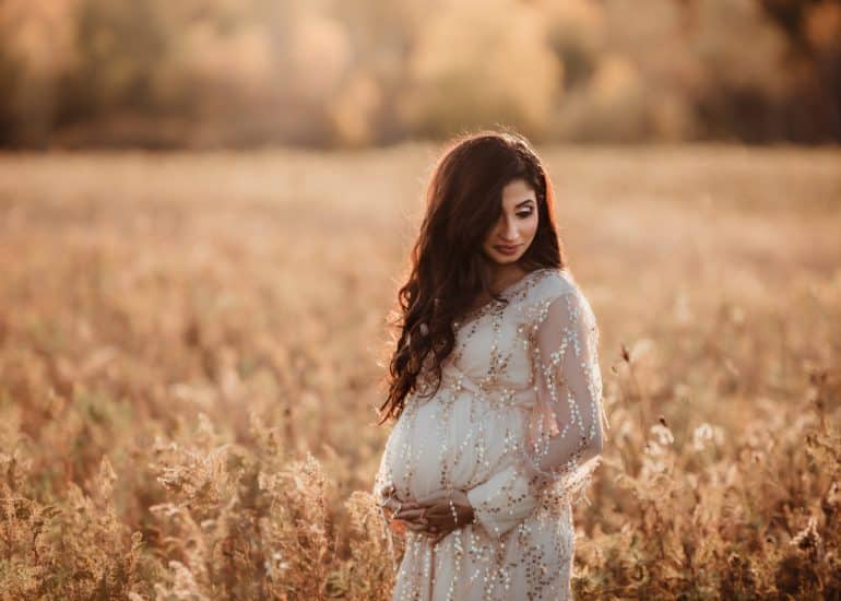 expecting mom at sunset