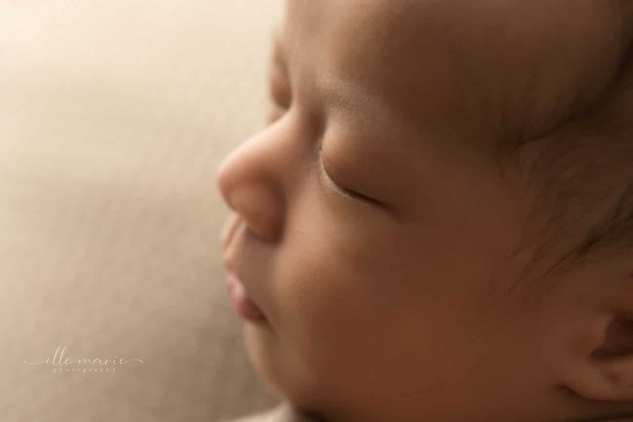 newborn baby close up of side of face